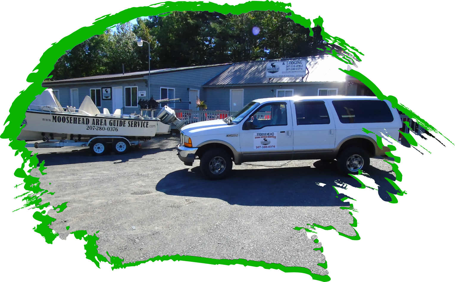 A white truck and trailer in the parking lot.