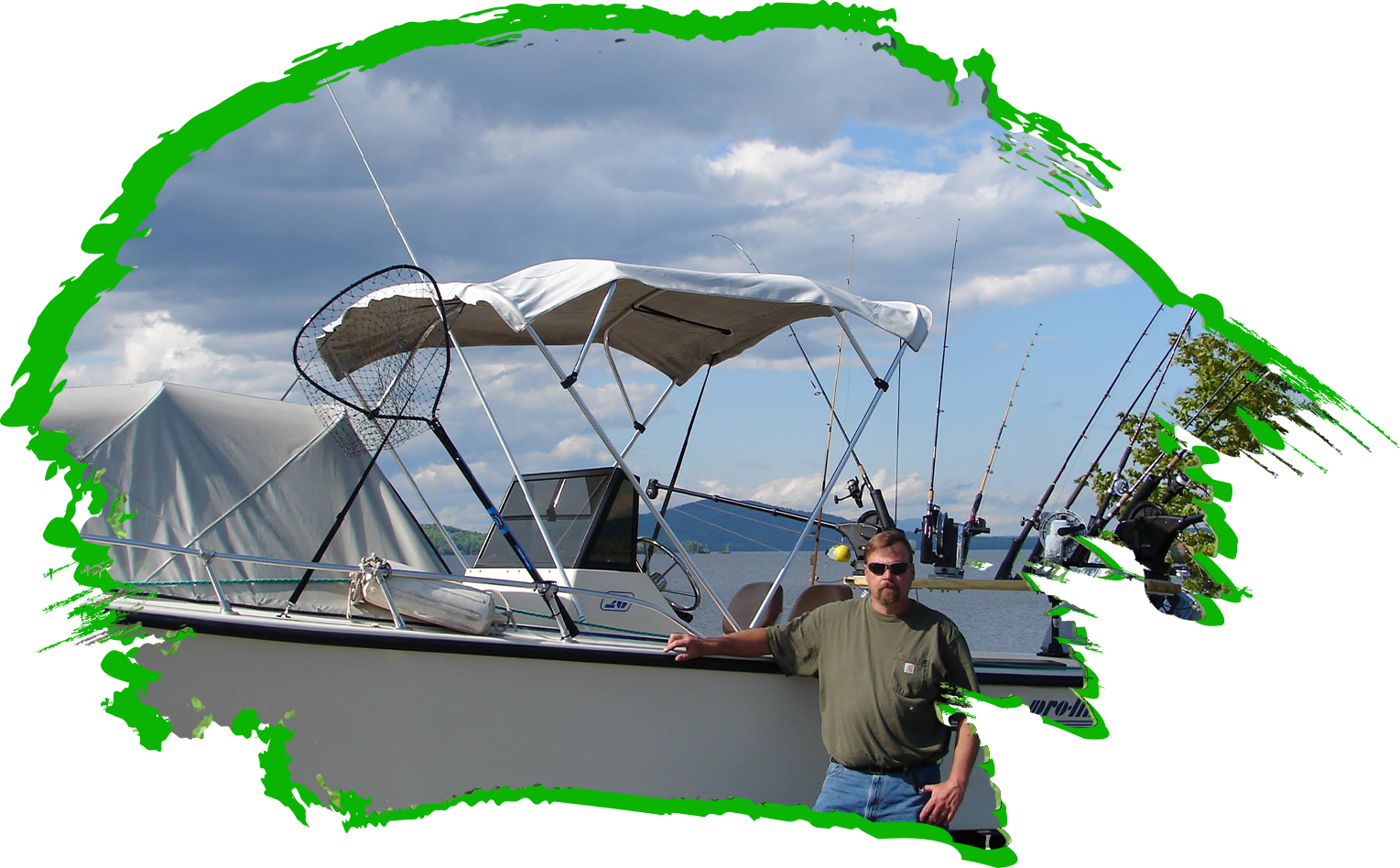 A man standing on the side of a boat.